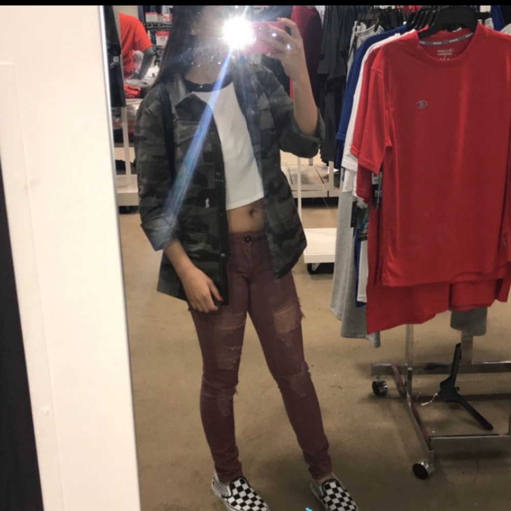 Jacket, crop top, and ripped jeans